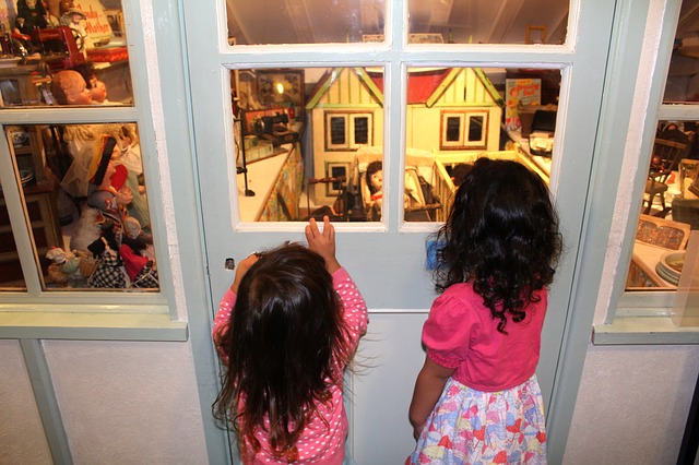 Kids learning and entertaining themselves at Presbytère Museum in New Orleans- of the fun things to do in New Orleans with kids